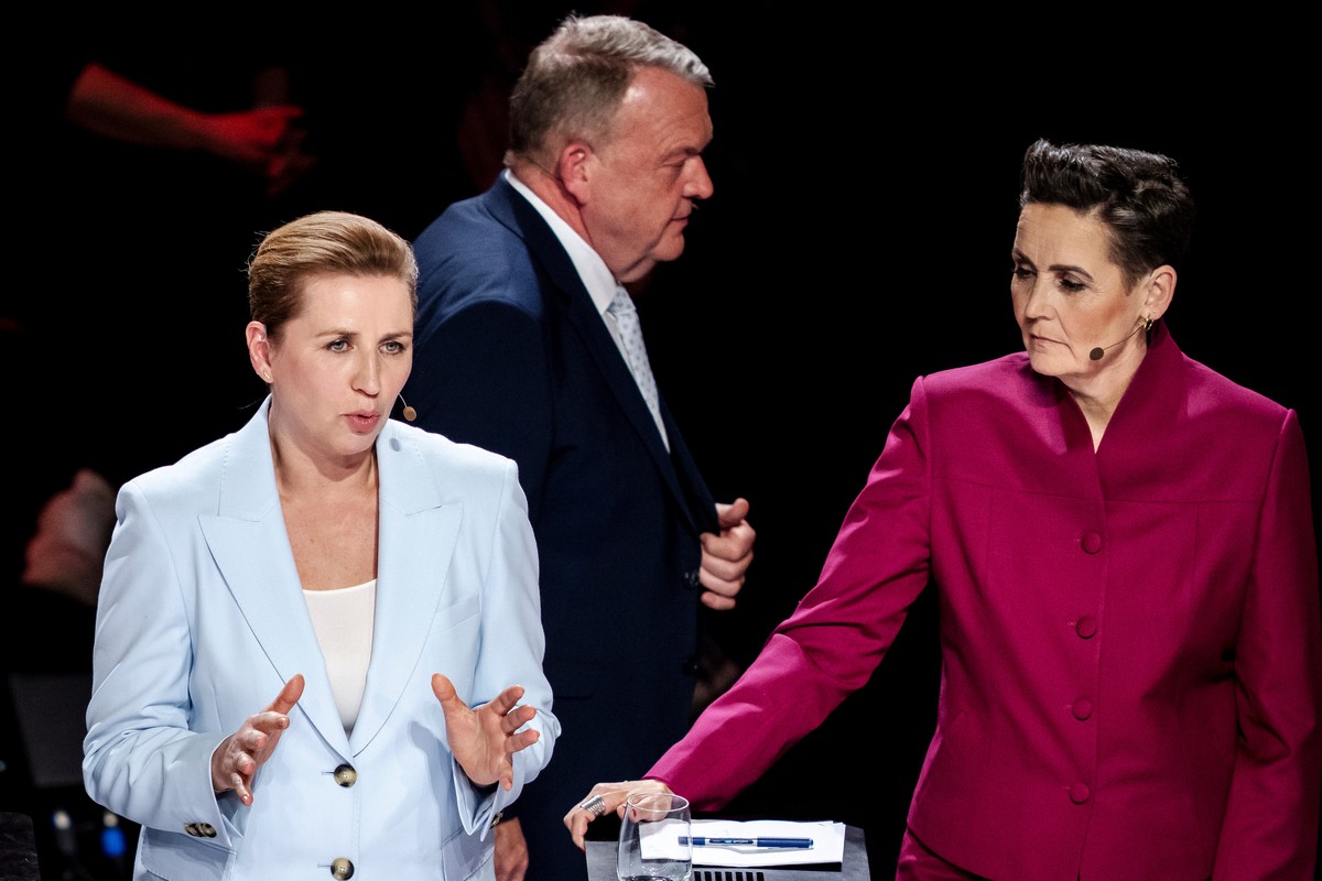 Denmark's Prime Minister Mette Frederiksen, left, Lars Loekke Rasmussen, center, and Pia Olsen Dyhr, right, attend the party leader debate Democracy's Evening on DR1 at the Concert Hall, DR  ...