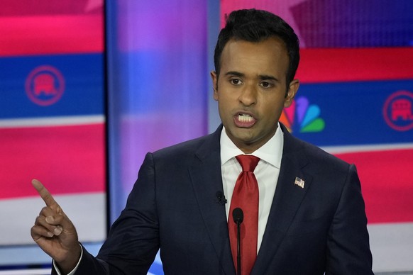 Republican presidential candidate businessman Vivek Ramaswamy speaks during a Republican presidential primary debate hosted by NBC News, Wednesday, Nov. 8, 2023, at the Adrienne Arsht Center for the P ...