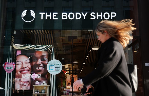 epa11147494 A pedestrian passes a Body Shop store in London, Britain, 12 February 2024. The Body Shop UK is set to appoint administrators for its UK arm, which may see the closure of some two hundred  ...