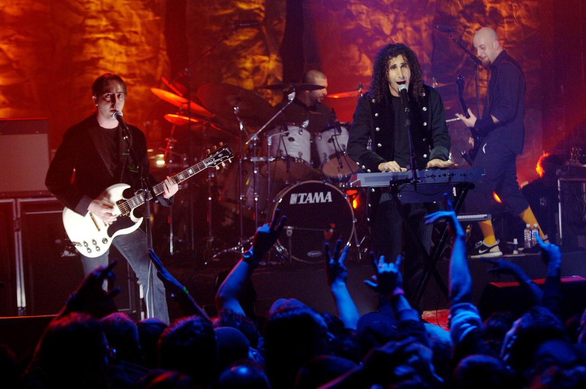 System of a Down lead singer Serj Tankian, second from right, lead guitarist Daron Malakian, left, drummer John Dolmayan, second from left, and bass player Shavo Odadjian, right, perform on MTV2' ...