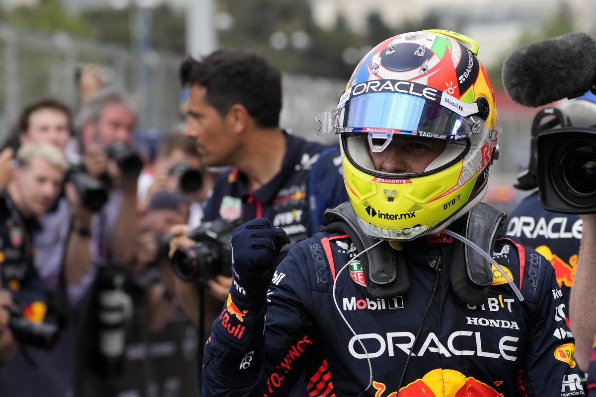 Red Bull driver Sergio Perez of Mexico celebrates after winning the Formula One Grand Prix at the Baku circuit, in Baku, Azerbaijan, Sunday, April 30, 2023. (AP Photo/Darko Bandic)