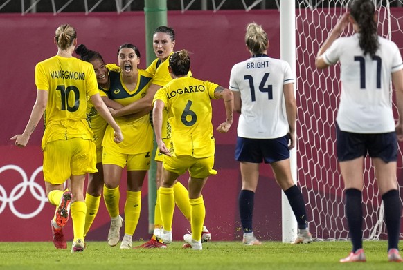 Australia&#039;s Sam Kerr, center, celebrates scoring her side&#039;s 4th goal against Britain during a women&#039;s quarterfinal soccer match at the 2020 Summer Olympics, Friday, July 30, 2021, in Ka ...