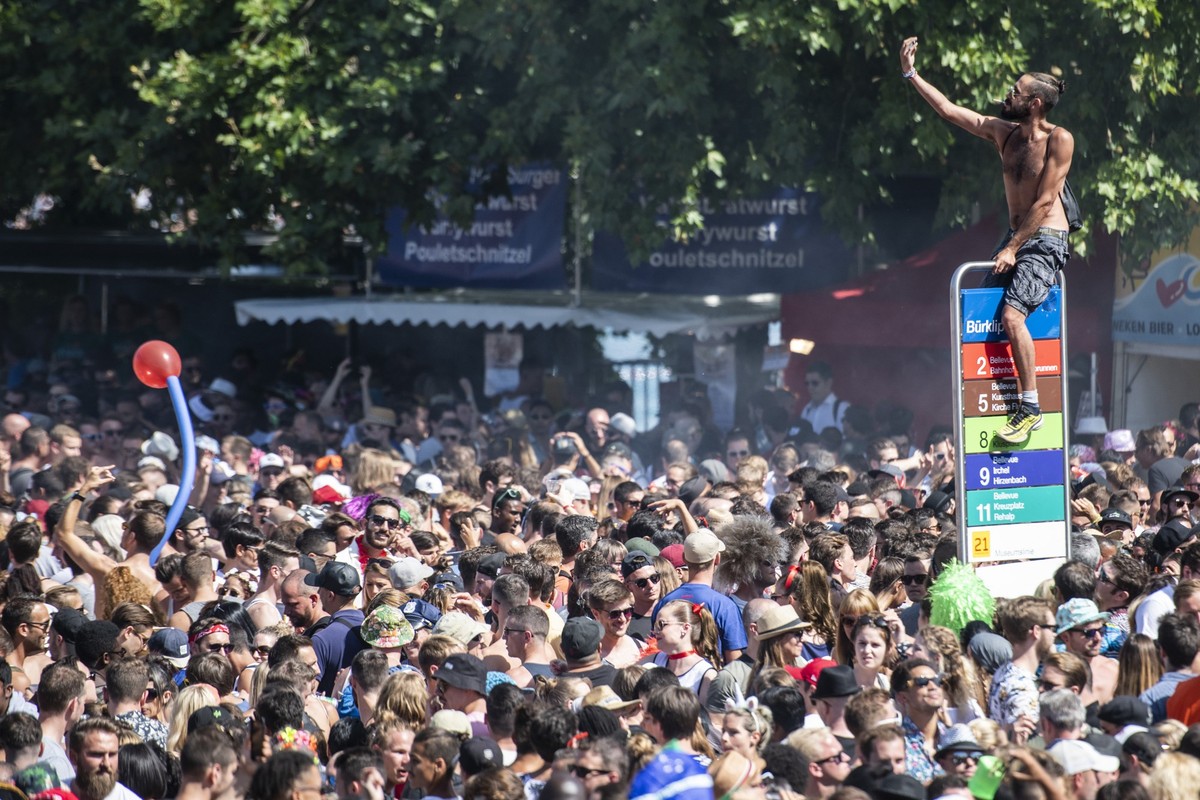 Hundreds of thousands of participants dancing through the streets during the 27th Street Parade, an annual dance music parade, in the city center of Zurich, Switzerland, Saturday, August 11, 2018. The ...