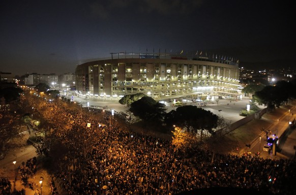Catalan pro-independence demonstrators gather outside the Camp Nou stadium ahead of a Spanish La Liga soccer match between Barcelona and Real Madrid in Barcelona, Spain, Wednesday, Dec. 18, 2019. Thou ...