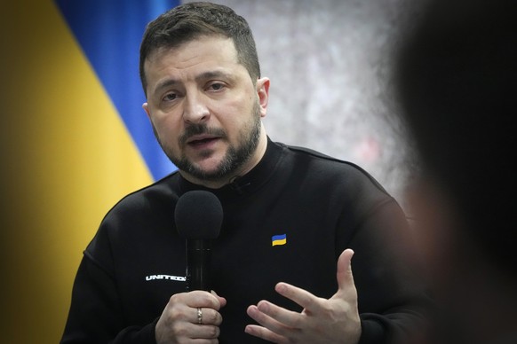 Ukrainian President Volodymyr Zelenskyy speaks at his press conference marking the one-year anniversary of the war between Russia and Ukraine, in Kiev, Ukraine, Friday, Feb. 24, 2023. (AP Photo/Efrem Luka ...