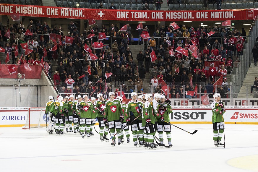 Switzerland&#039;s players celebrate their 6-1 victory, during the Swiss Ice Hockey Challenge 2016 between Switzerland and Belarus, at the Tissot Arena in Biel, Switzerland, on Saturday, December 17,  ...