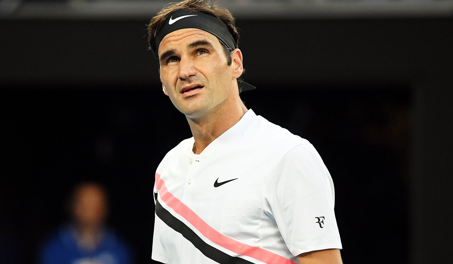 epa06442745 Roger Federer of Switzerland reacts during his first round match against Aljaz Bedene of Slovenia at the Australian Open Grand Slam tennis tournament in Melbourne, Australia, 16 January 20 ...