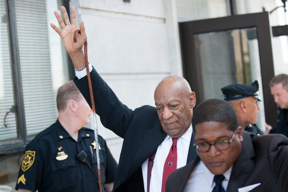 epa06695192 US entertainer Bill Cosby (C) departs the Montgomery County Courthouse in Norristown, Pennsylvania, USA, 26 April 2018. US entertainer, Bill Cosby, has been convicted on three counts of se ...