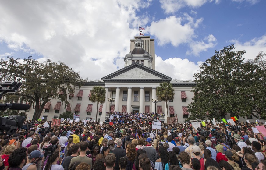 Protesters rally against gun violence on the steps of the old Florida Capitol in Tallahassee, Fla., Wednesday, Feb 21, 2018. Students at schools across Broward and Miami-Dade counties in South Florida ...