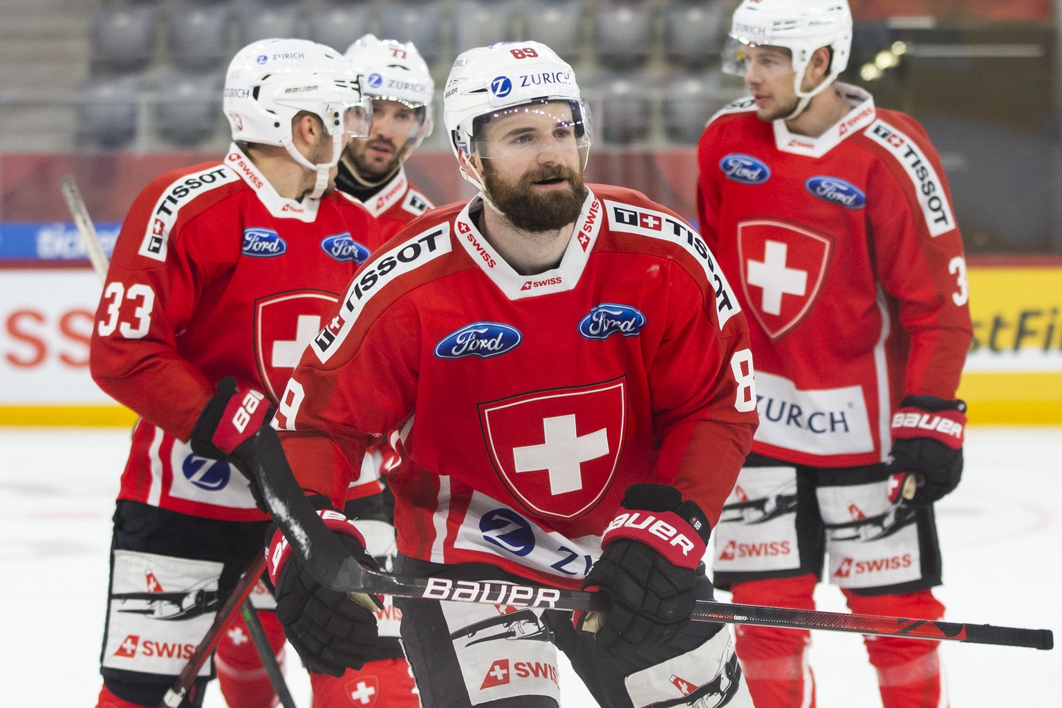 Switzerland&#039;s Fabian Heldner, front, after scoring the 1-0 during a friendly ice hockey match between Switzerland and Russia, at the Tissot Arena in Biel, Switzerland, Saturday, May 1, 2021. (Pos ...