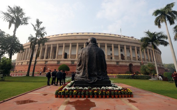 epa11010312 A general view of the old parliament building prior to new winter session at the new Parliament House building in New Delhi, India, 04 December 2023. Modi said that Parliament, the temple  ...