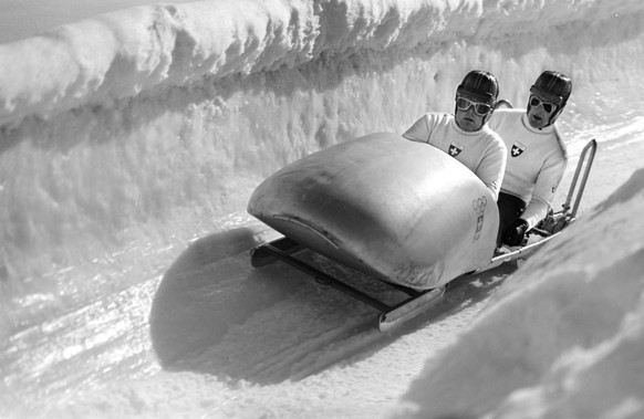 Swiss bobsledders Felix Endrich and Friedrich Waller ride the two-man bobsled on the bobsled run at the Olympic Winter Games in St. Moritz in the canton of Grisons, Switzerland, in February 1948. (KEY ...