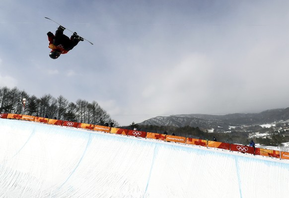 Patrick Burgener, of Switzerland, jumps during the men&#039;s halfpipe qualifying at Phoenix Snow Park at the 2018 Winter Olympics in Pyeongchang, South Korea, Tuesday, Feb. 13, 2018. (AP Photo/Gregor ...