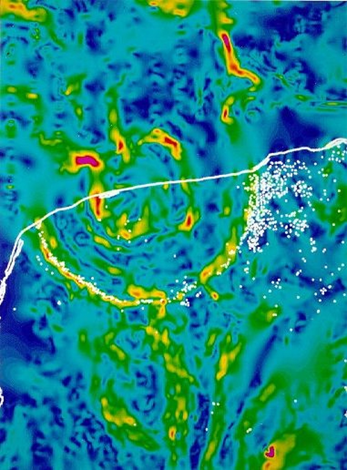 Sketch of the gravity anomaly map of the Chicxulub crater area. Red and yellow are gravity highs, green and blue are gravity lows, white indicates sinkholes, or "cenotes", and the shaded are ...