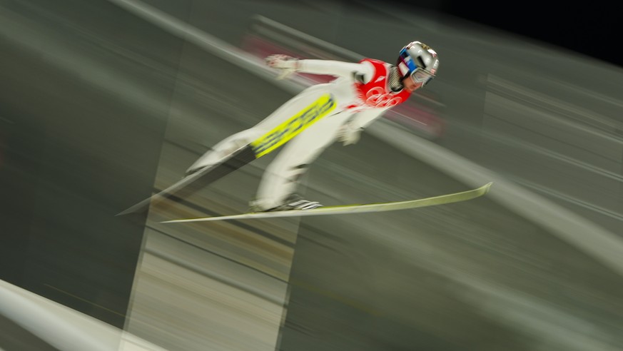 Sophie Sorschag, of Austria, soars through the air during the women&#039;s normal hill individual first round at the 2022 Winter Olympics, Saturday, Feb. 5, 2022, in Zhangjiakou, China. (AP Photo/Matt ...
