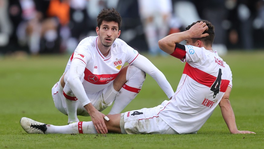 epa09057003 Atakan Karazor (L) and Marc-Oliver Kempf of VfB Stuttgart react after the German Bundesliga soccer match between Eintracht Frankfurt and VfB Stuttgart at Deutsche Bank Park in Frankfurt am ...