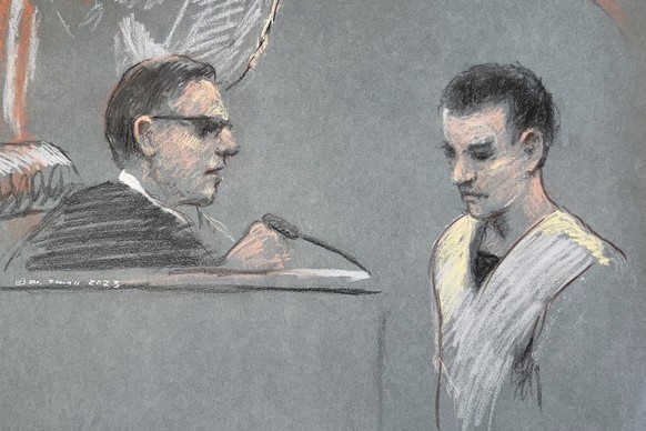 FILE - This artist depiction shows Massachusetts Air National Guardsman Jack Teixeira, right, appearing in U.S. District Court in Boston, April 14, 2023. A judge is poised to decide whether the Massac ...