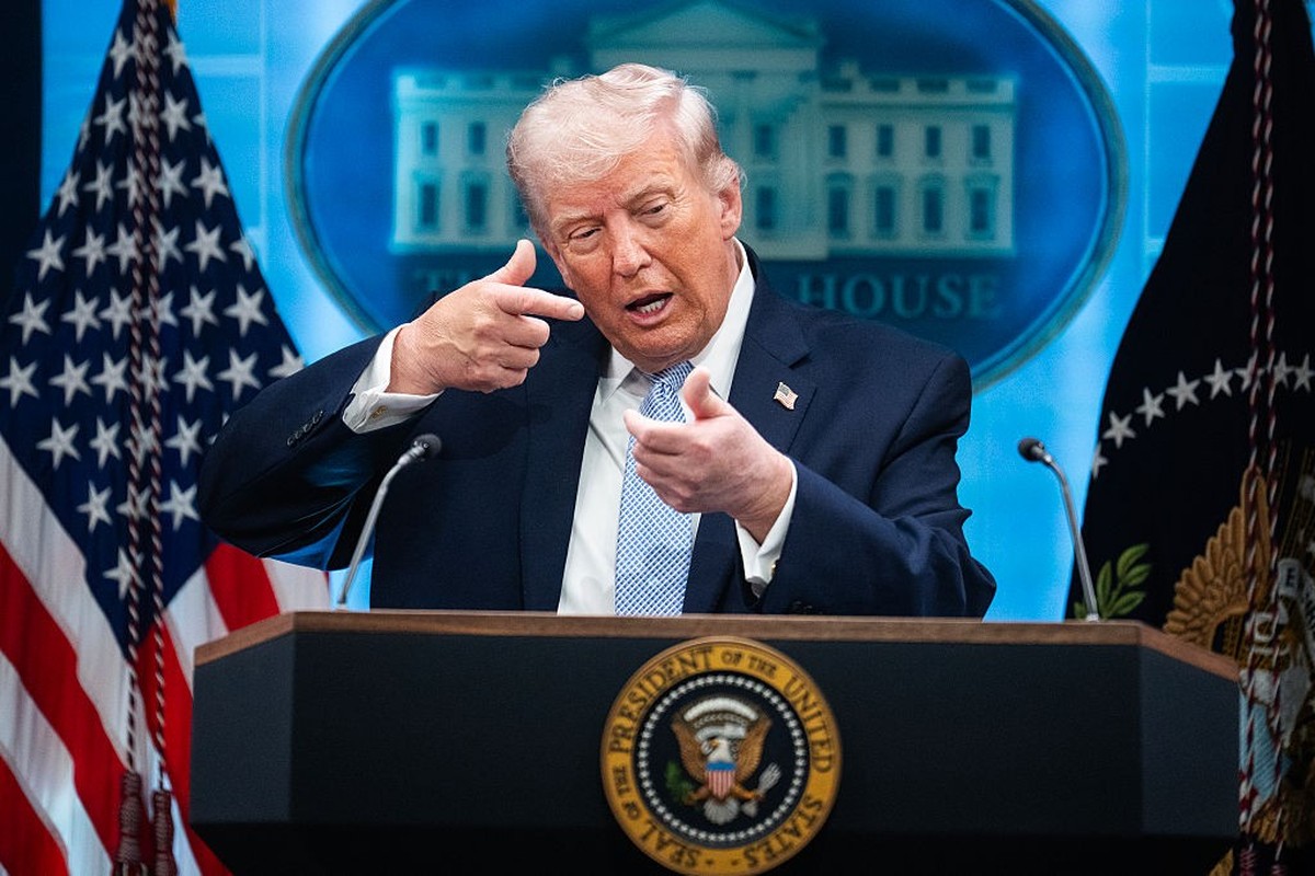 UNITED STATES - APRIL 6: President Donald Trump mimics firing a gun during a news conference in the White House briefing room about the war in Iran on Monday, April 6, 2026. (Tom Williams/CQ-Roll Call ...