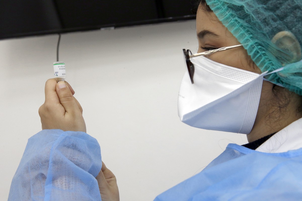 A Moroccan nurse prepares a syringe with the Sinopharm Covid-19 vaccine, on the first day of the vaccination campaign, in Casablanca, Morocco, Friday, Jan. 29, 2021. The King of Morocco Mohammed VI re ...