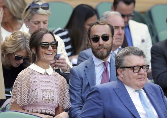 Pippa Middleton, left and her brother James sit in the Royal Box on day three at the Wimbledon Tennis Championships in London Wednesday, July 5, 2017. (AP Photo/Tim Ireland)