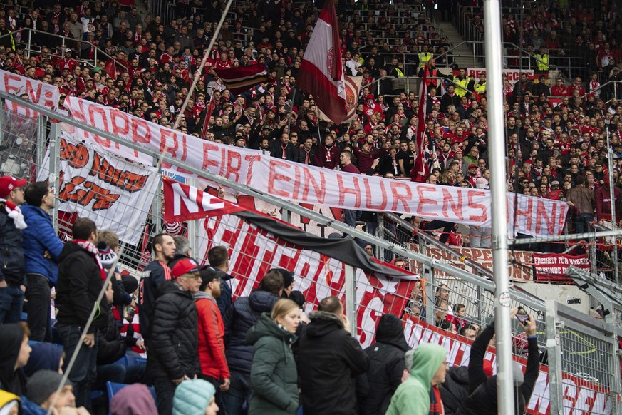 Bayern Munich supporters lift a banner reading &#039;Hopp remain a son of a bitch&#039; against Hoffenheim club patron Dietmar Hopp during the German Bundesliga soccer match between TSG Hoffenheim and ...