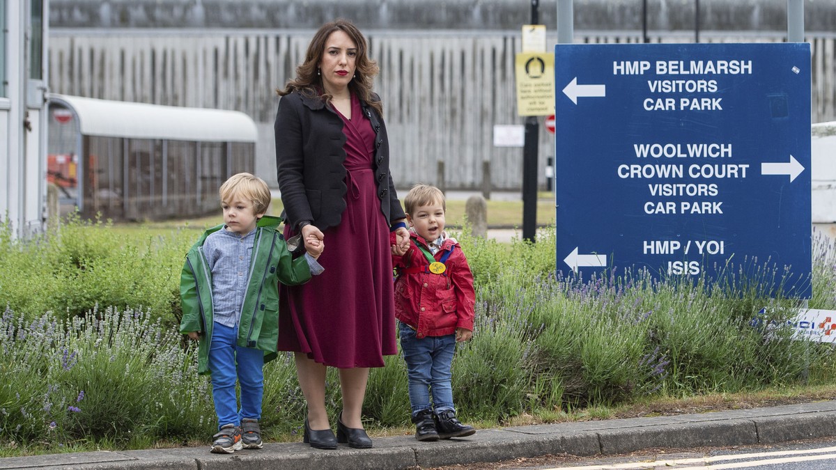 Stella Moris stands with her children Gabriel, four, left, and Max, two, outside Belmarsh Prison, following a visit to her partner and their father Julian Assange in London, Saturday June 19, 2021. As ...