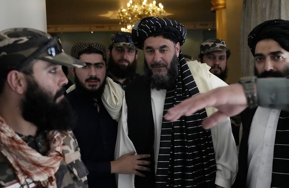 Bashir Noorzai, center, a senior Taliban detainee held at Guantanamo attends his release ceremony, at the Intercontinental Hotel, in Kabul, Afghanistan, Monday, Sept. 19, 2022. Bashir Noorzai, a notor ...