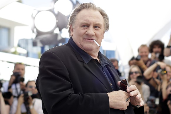 Actor Gerard Depardieu poses for photographers during a photo call for the film Valley of Love, at the 68th international film festival, Cannes, southern France, on May 22, 2015. (AP Photo/Thibault Ca ...