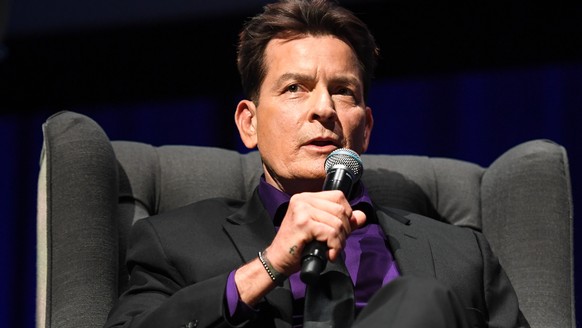 epa07138334 US actor Charlie Sheen is seen on stage during his &#039;An Evening With Charlie Sheen&#039; live show, hosted by Australian television presenter Richard Wilkins, at Melbourne Convention C ...