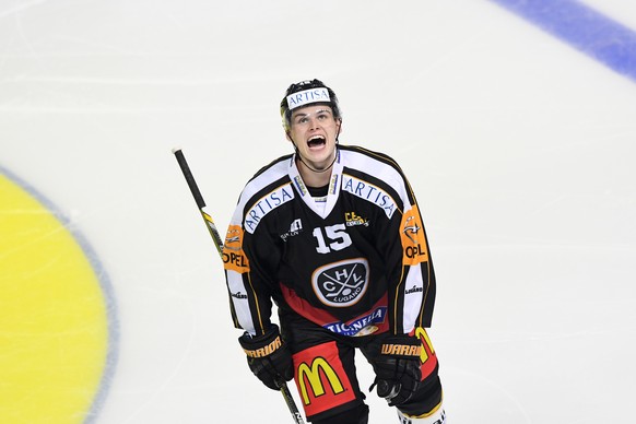 Luganoâs player Gregory Hofmann celebrates the goal of 4 to 1 during the preliminary round game of National League A (NLA) Swiss Championship 2016/17 between HC Lugano and HC Ambri Piotta, at the ic ...