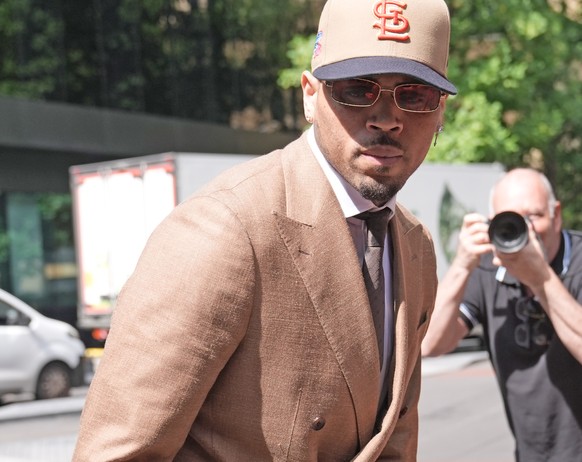 Chris Brown arrives at Southwark Crown Court, where he is charged over an alleged assault in a London nightclub, in London, Friday, July 24, 2026. (Stefan Rousseau/PA via AP)
Britain Chris Brown