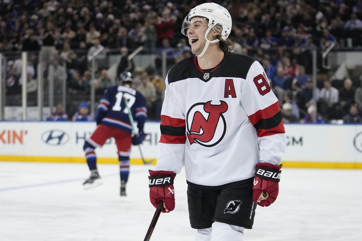 New Jersey Devils' Jack Hughes (86) smiles after scoring a goal during the second period of an NHL hockey game against the New York Rangers, Thursday, Jan. 9, 2025, in New York. (AP Photo/Frank F ...