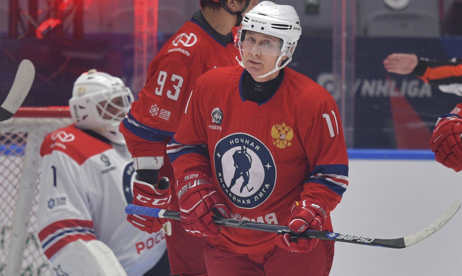 Russian President Vladimir Putin attends a gala match with the participation of Russian hockey legends as part of the final stage of the X All-Russian Night Hockey League festival in the Bolshoi Ice P ...