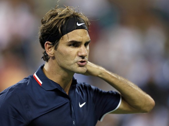 Roger Federer, of Switzerland, reacts during a quarterfinals match against Tomas Berdych, of Czech Republic, at the U.S. Open tennis tournament on Wednesday, Sept. 5, 2012, in New York. (AP Photo/Darr ...