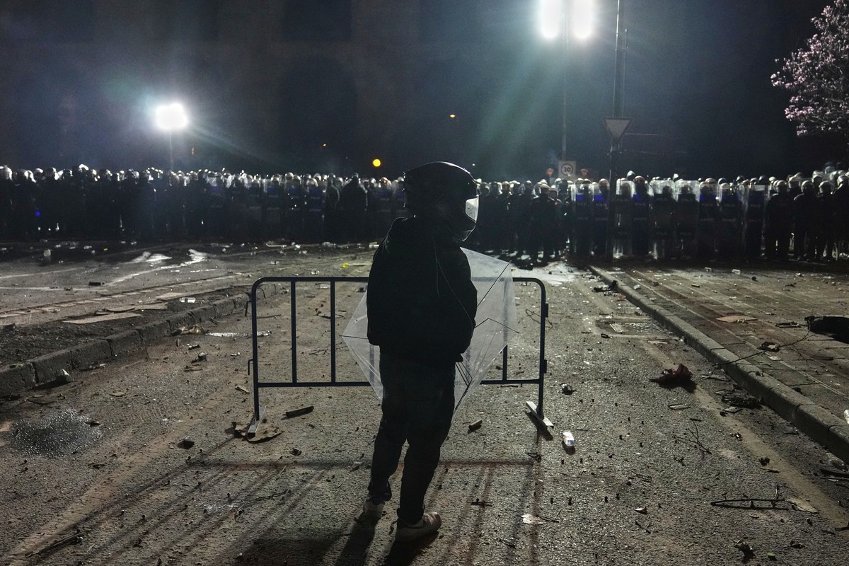 A protester stands in front of riot police during a protest against the arrest of Istanbul's Mayor Ekrem Imamoglu, in Istanbul, Turkey, Saturday, March 22, 2025. (AP Photo/Khalil Hamra)
Turkey Po ...