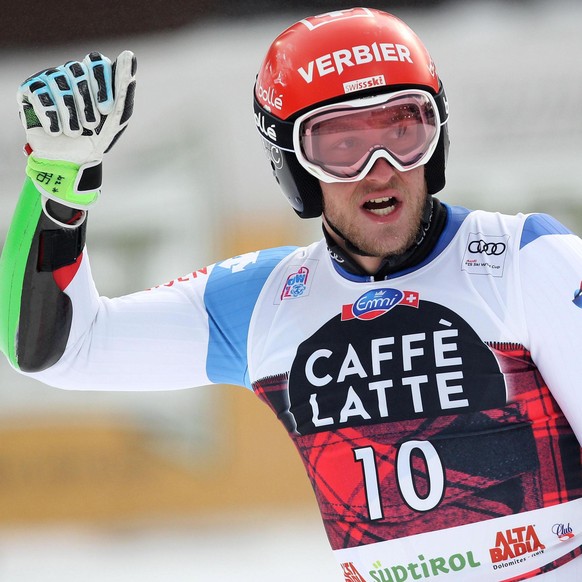 epa06395206 Justin Murisier of Switzerland reacts in the finish area for the Giant Slalom race at the FIS Alpine Ski World Cup in Alta Badia, Italy, 17 December 2017. EPA/ANDREA SOLERO