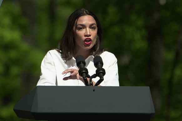 Rep. Alexandria Ocasio-Cortez, D-N.Y., speaks before President Joe Biden at Prince William Forest Park on Earth Day, Monday, April 22, 2024, in Triangle, Va. Biden is announcing $7 billion in federal  ...