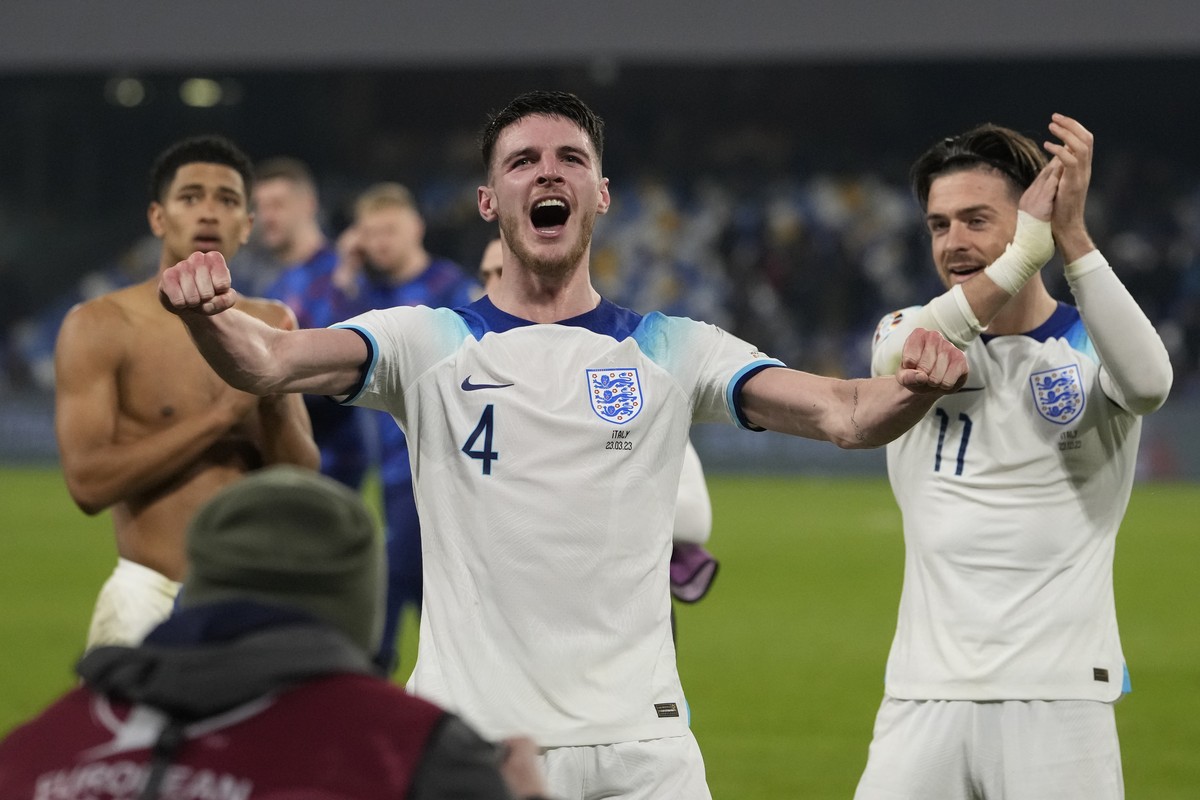 England's Declan Rice celebrates after the Euro 2024 group C qualifying soccer match between Italy and England at the Diego Armando Maradona stadium in Naples, Italy, Thursday, March 23, 2023. (A ...
