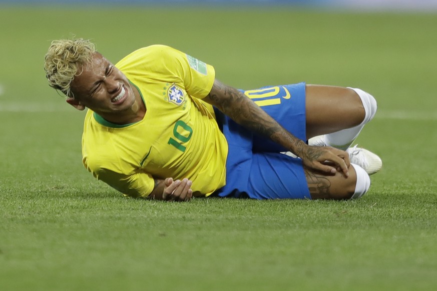 Brazil's Neymar grimaces during the group E match against Switzerland at the 2018 soccer World Cup in the Rostov Arena in Rostov-on-Don, Russia, Sunday, June 17, 2018. (AP Photo/Andre Penner)