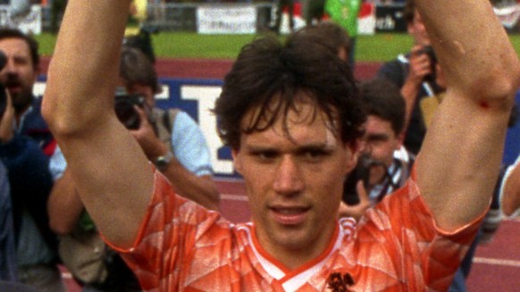 Dutch soccer player Marco van Basten raises the raises the European soccer Cup over his head in celebration, after the Netherlands won the European Soccer Championships beating Russia 2-0 in Munich, W ...