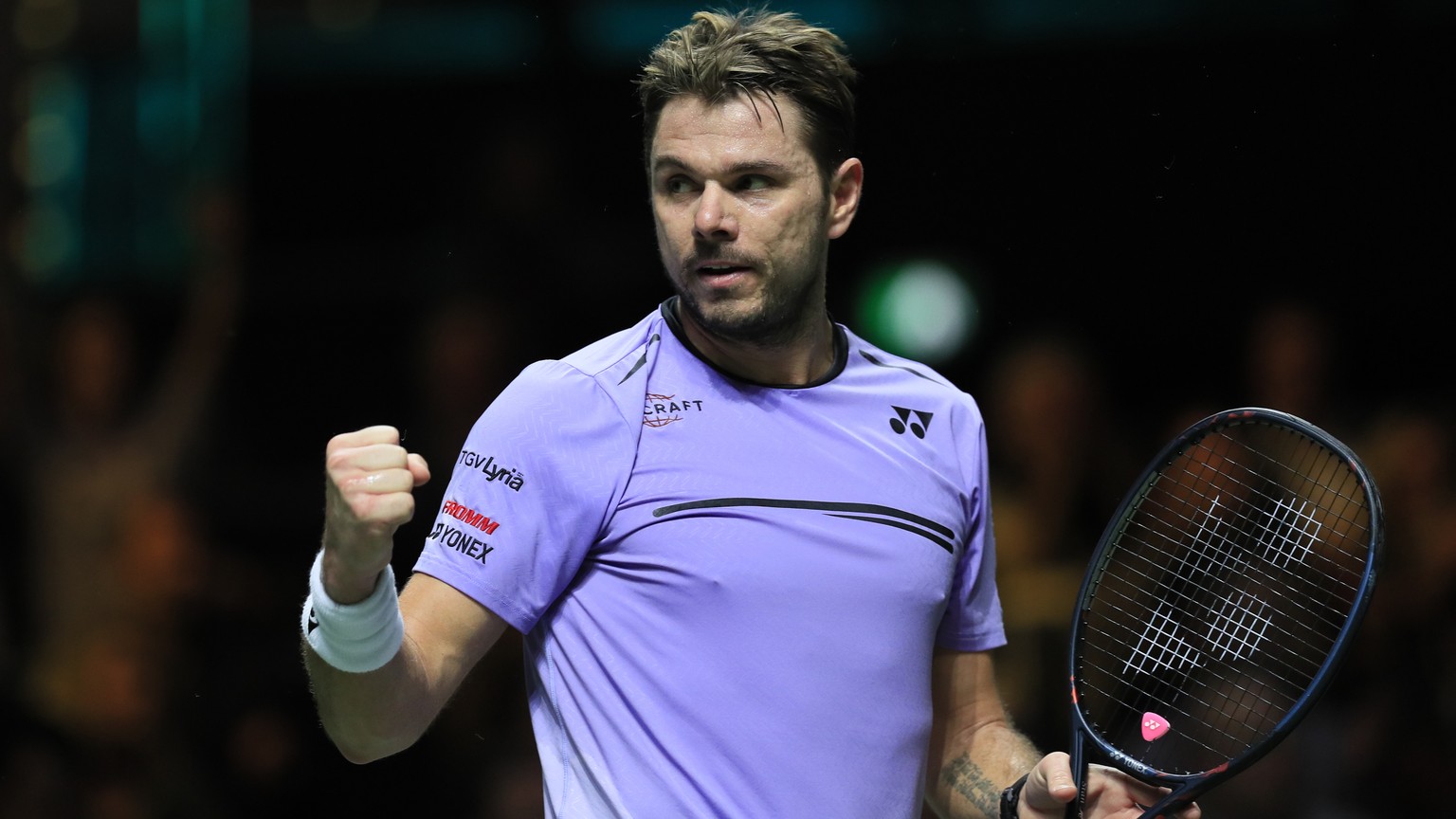 Stan Wawrinka of Switzerland clenches his fist after scoring a point against Gael Monfils of France in the men&#039;s singles final of the ABN AMRO world tennis tournament at Ahoy Arena in Rotterdam,  ...