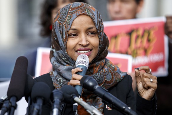 epa07351073 Democratic Representative from Minnesota Ilhan Omar delivers remarks during a press conference on deportation at Capitol Hill in Washington, DC, USA, 07 February 2019. During the press con ...