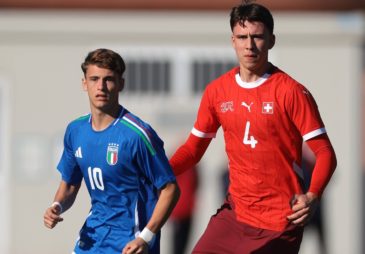 Gavirate, Italy, 17th November 2024. Andrea Orlandi of Italy is pursued by Eman Kospo of Switzerland during the International Friendly, L