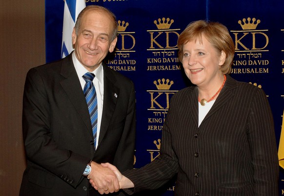 Der damalige israelische Ministerpräsident Ehud Olmert mit der deutschen Bundeskanzlerin Angela Merkel in Jerusalem. (29.01.2006)