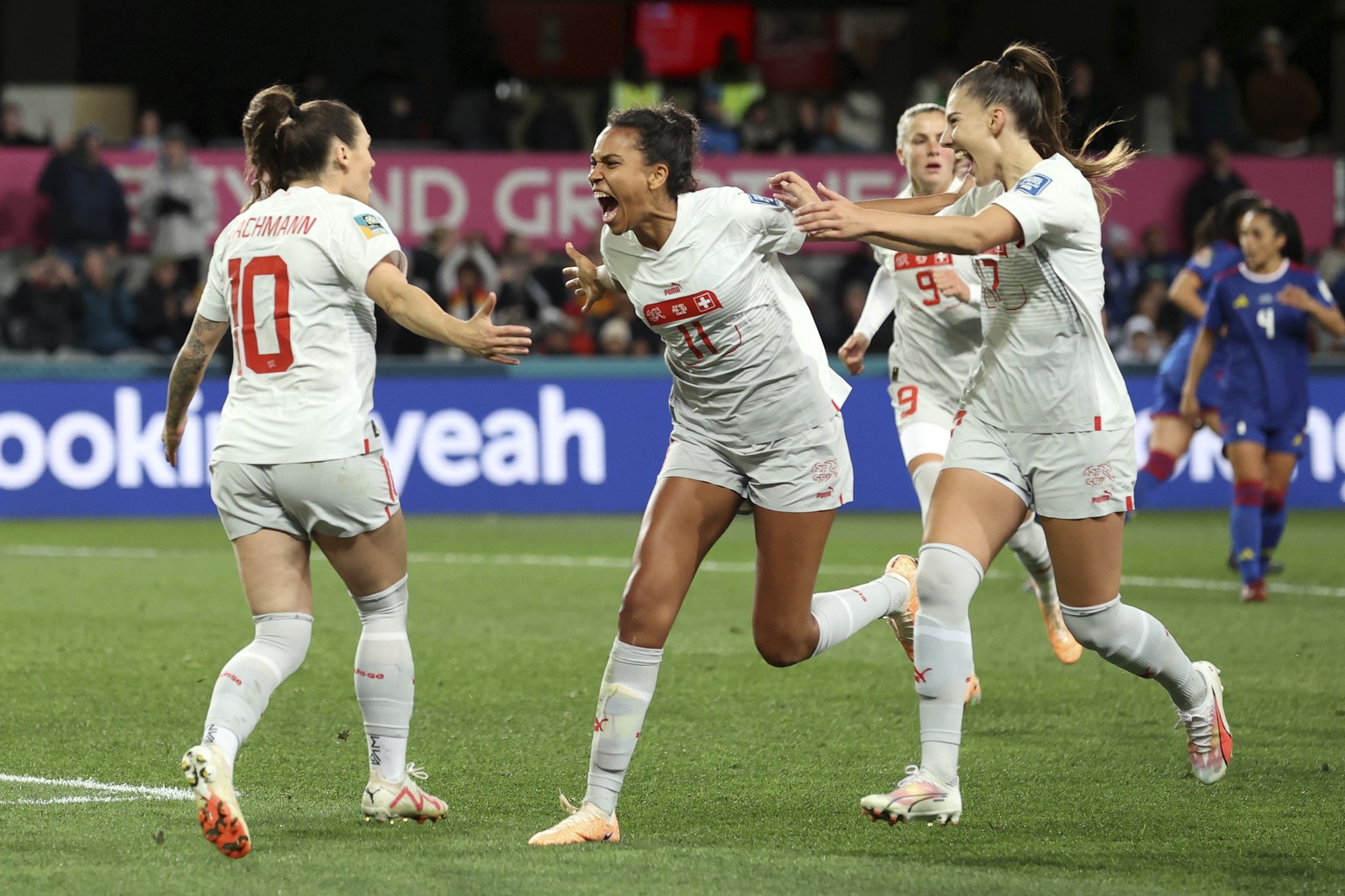 Switzerland&#039;s Ramona Bachmann, left, celebrates with Coumba Sow (11) after scoring a penalty kick in the first half of the Group A Women&#039;s World Cup soccer match between the Philippines and  ...