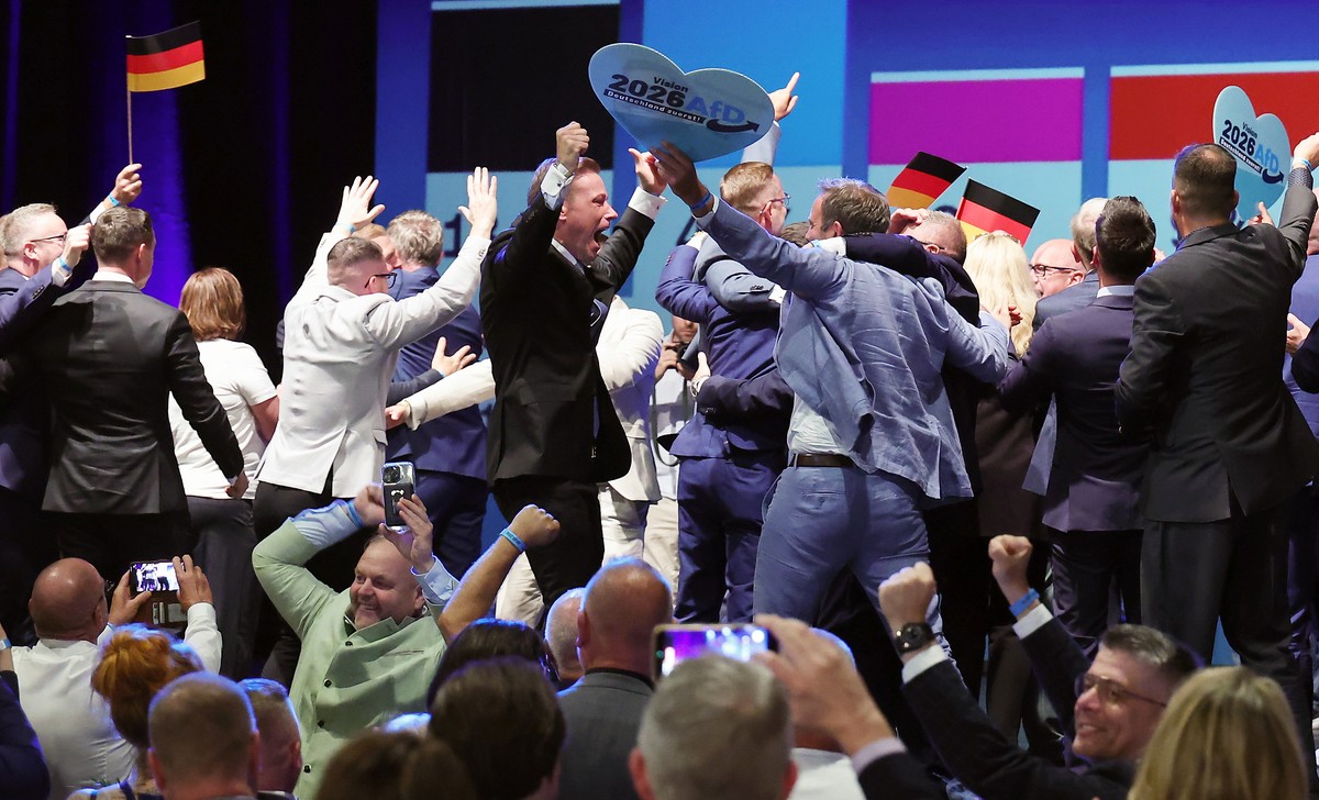 epa13217585 People react to exit polls during the far-right Alternative for Germany (AfD) election party following Saxony-Anhalt state election, in Magdeburg, Germany, 06 September 2026. Voters in Sax ...