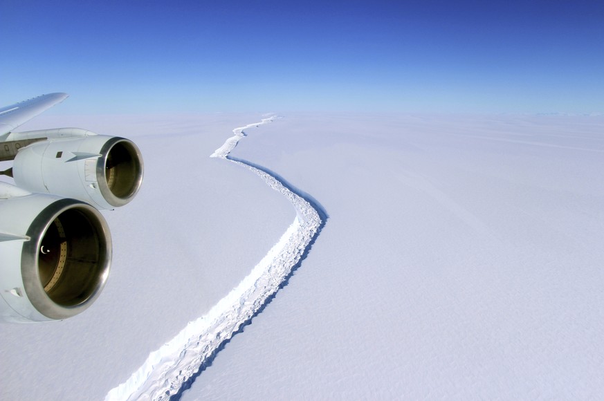 This Nov. 10, 2016 aerial photo released by NASA, shows a rift in the Antarctic Peninsula&#039;s Larsen C ice shelf. According to NASA, IceBridge scientists measured the Larsen C fracture to be about  ...