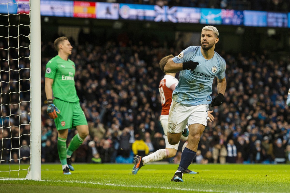 epa07340753 Manchester City's Sergio Aguero celebrates scoring the first goal during the English Premier League soccer match between Manchester City and Arsenal FC held at the Etihad Stadium in M ...