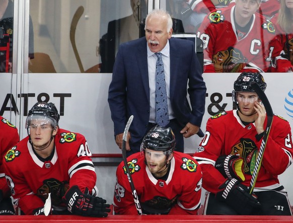 FILE - In this Oct. 7, 2017, file photo, Chicago Blackhawks head coach Joel Quenneville yells to his team during the third period of an NHL hockey game against the Columbus Blue Jackets, in Chicago. F ...