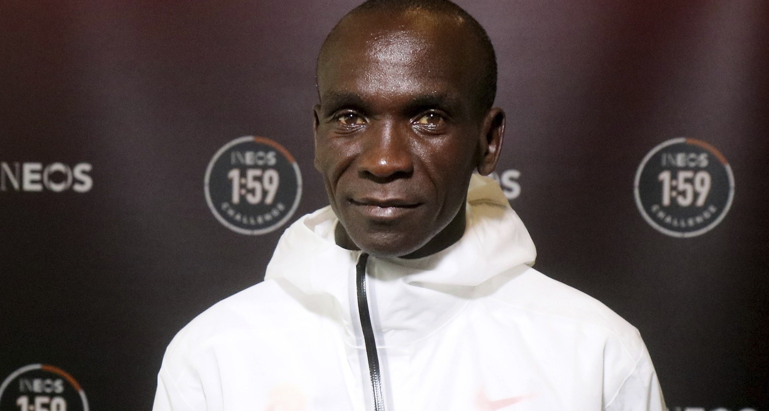 Marathon runner Eliud Kipchoge from Kenya poses for photographers prior to a press conference in Vienna, Austria, Thursday, Oct. 10, 2019. Kipchoge&#039;s attempt to run a sub two-hour marathon has be ...